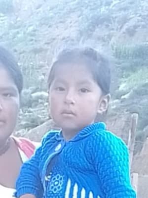 An unsponsored girl named Zeyneth from Bolivia who has waited 517 days for a sponsor