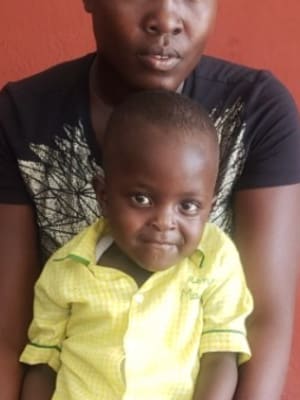An unsponsored boy named Macken from Haiti who is vulnerable to exploitation and has waited 452 days for a sponsor
