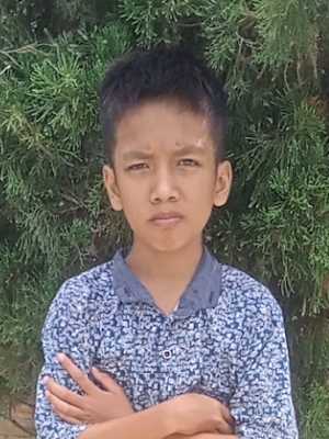 An unsponsored boy named Bona from Indonesia who has waited 506 days for a sponsor