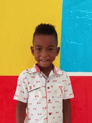 An unsponsored boy named Jhon from Colombia who has waited 429 days for a sponsor