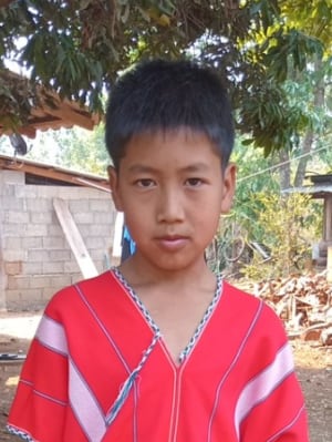 An unsponsored boy named Tanapon from Thailand who has waited 505 days for a sponsor
