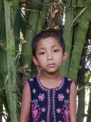 An unsponsored girl named Asha from Bangladesh who is vulnerable to exploitation and has waited 270 days for a sponsor
