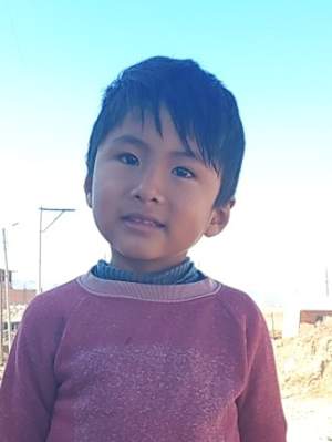 An unsponsored boy named Moises from Bolivia who has waited 507 days for a sponsor