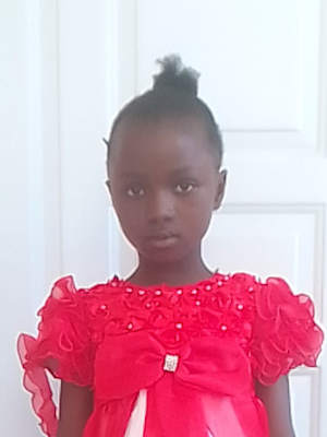 An unsponsored girl with a disability named Richecardinia from Haiti who is vulnerable to exploitation