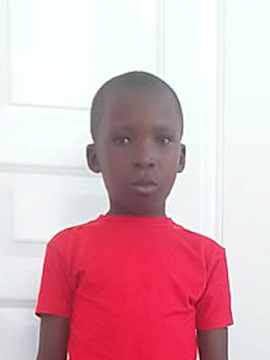 An unsponsored boy with a disability named Verdely from Haiti who is vulnerable to exploitation